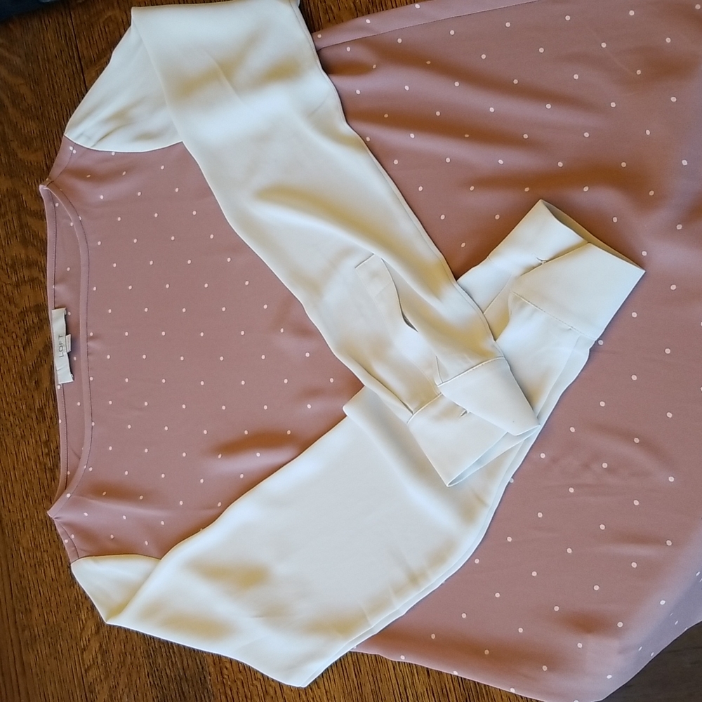 Pink polka dot boatneck top with white sleeves